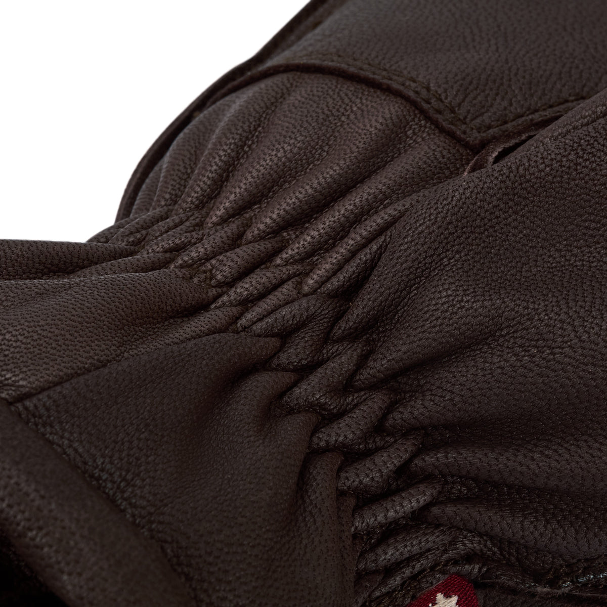 Close-up of Rue Gear goatskin leather texture and elastic wrist cuff